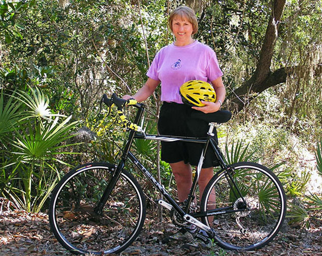 Kathy with her bike Destiny.